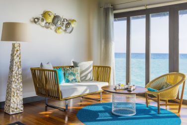 Dans la Villa sur pilotis vous aurez une vue paradisiaque depuis votre salon, sur les eaux maldiviennes