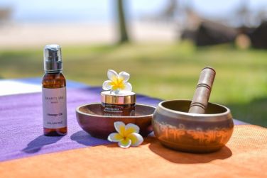 Massage aux huiles tropicales, odeurs divines garanties