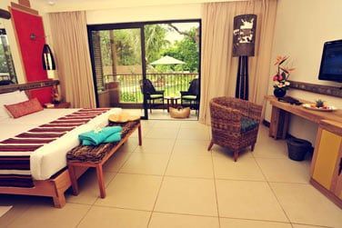 Certaines chambres Deluxe offrent une vue sur le jardin...