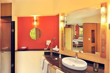 La salle de bain des chambres Deluxe