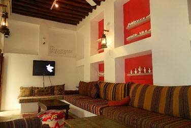 Le petit salon bibliothque traditionnel, climatis...