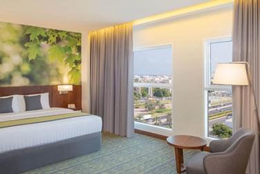 L'une des chambres du Wyndham Garden Muscat Al Khuwair 4*  Mascate
