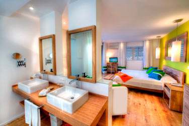 Salle de bain, ouverte sur la chambre dans le Cottage Suprieur