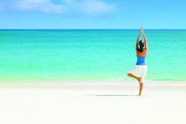 Quel beau cadre pour une sance de yoga sur la plage...