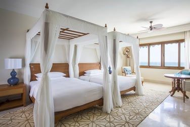 Avec lit double ou lits jumeaux