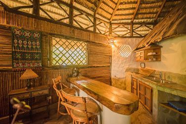 L'espace bar/cuisine du bungalow 1 chambre - Lit Queen size