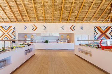 Le restaurant Palapa Beach sert des petits djeuners tardifs ou de dlicieux hamburgers
