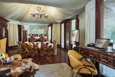 Chambre de la Villa 1 du Resort au dcor bois