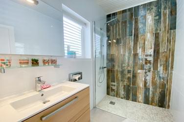 La salle de bain de la chambre Deluxe