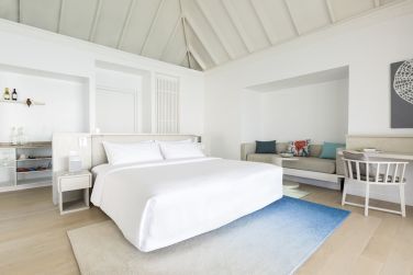 Dans la chambre villa sur Pilotis, un lit King Size