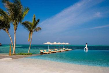 photo Double exprience plage & pilotis au LUX* South Ari Atoll Maldives