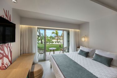 La deluxe family est cosy et confortable donnant sur une terrasse ensoleille