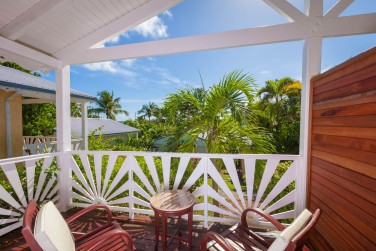 ... et son balcon donnant sur les jardins tropicaux.